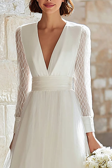 Robe de mariée longue ivoire à col en V profond avec tulle